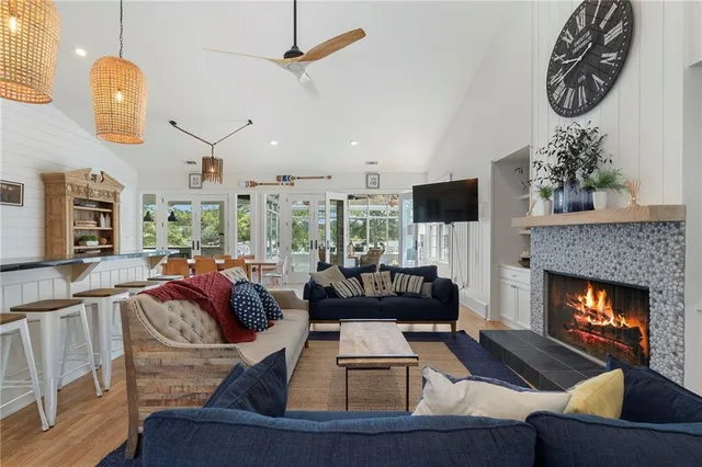 a kitchen with stainless steel appliances granite countertop a stove and cabinets