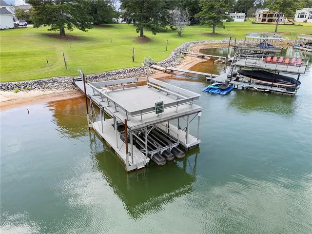 a view of a balcony with wooden floor