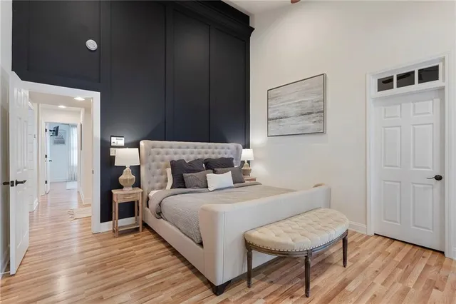 a view of a workspace with furniture and wooden floor