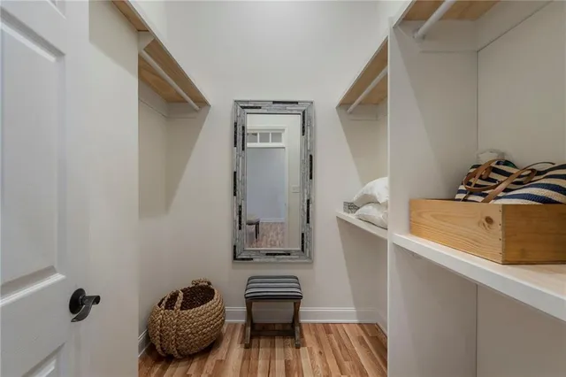 a view of a hallway with washer and dryer