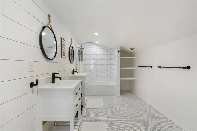 a view of a lake with boats and a mountain view