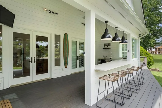 a living room with fireplace furniture and a flat screen tv