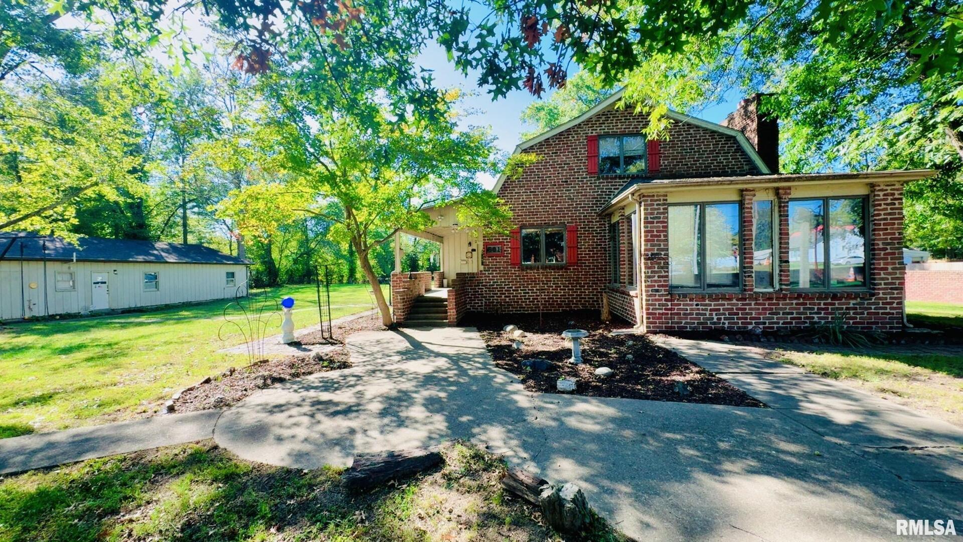 a front view of house with yard