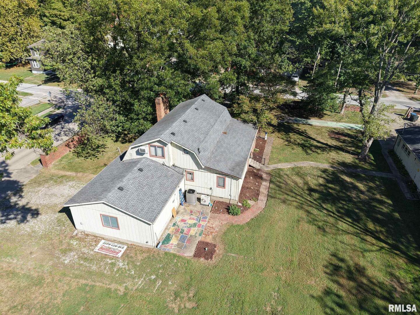601 1st Street Benton, IL 62812 - Photo 15 of 53 an aerial view of a house with pool