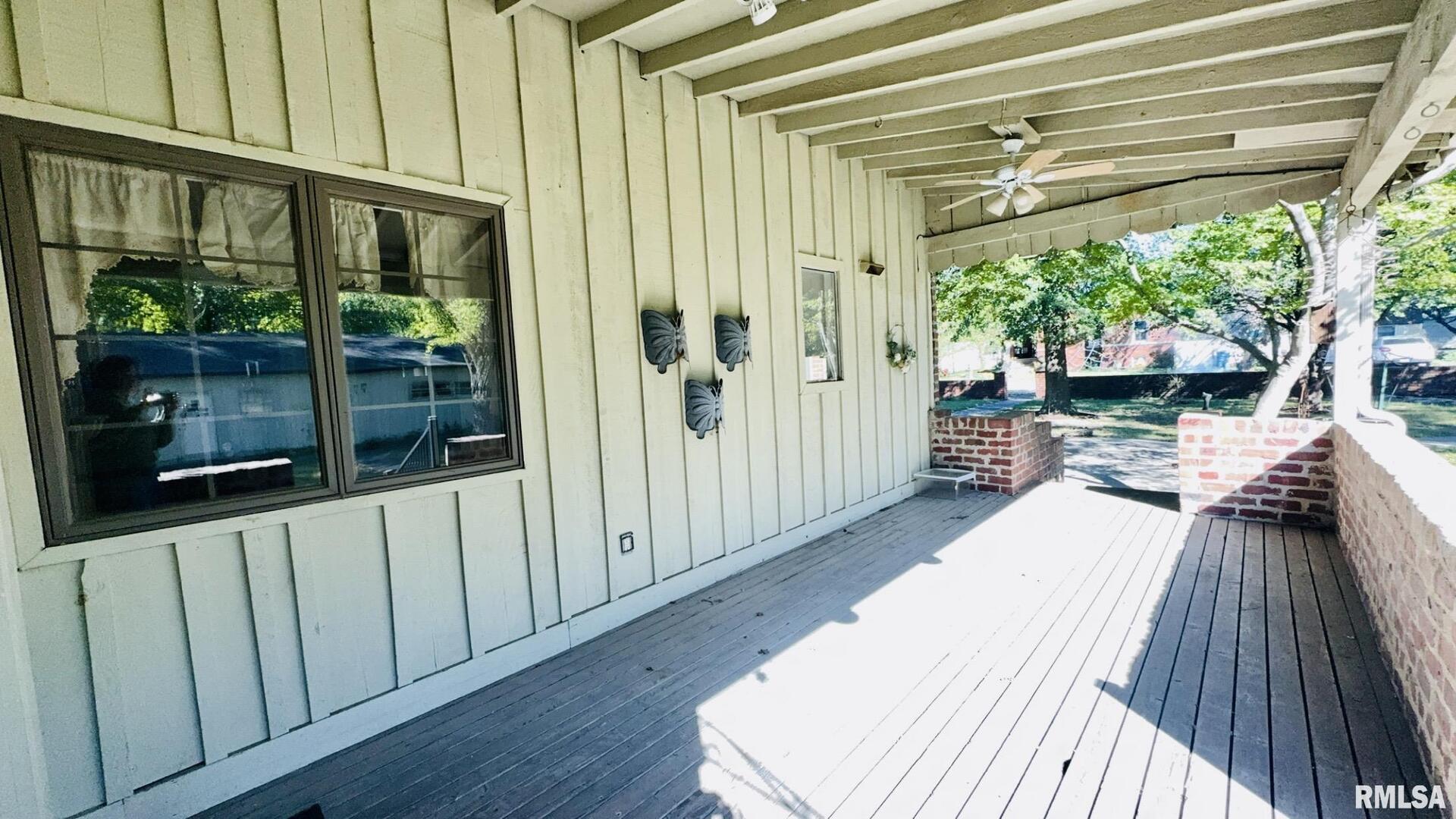 601 1st Street Benton, IL 62812 - Photo 22 of 53 a view of a balcony with wooden floor
