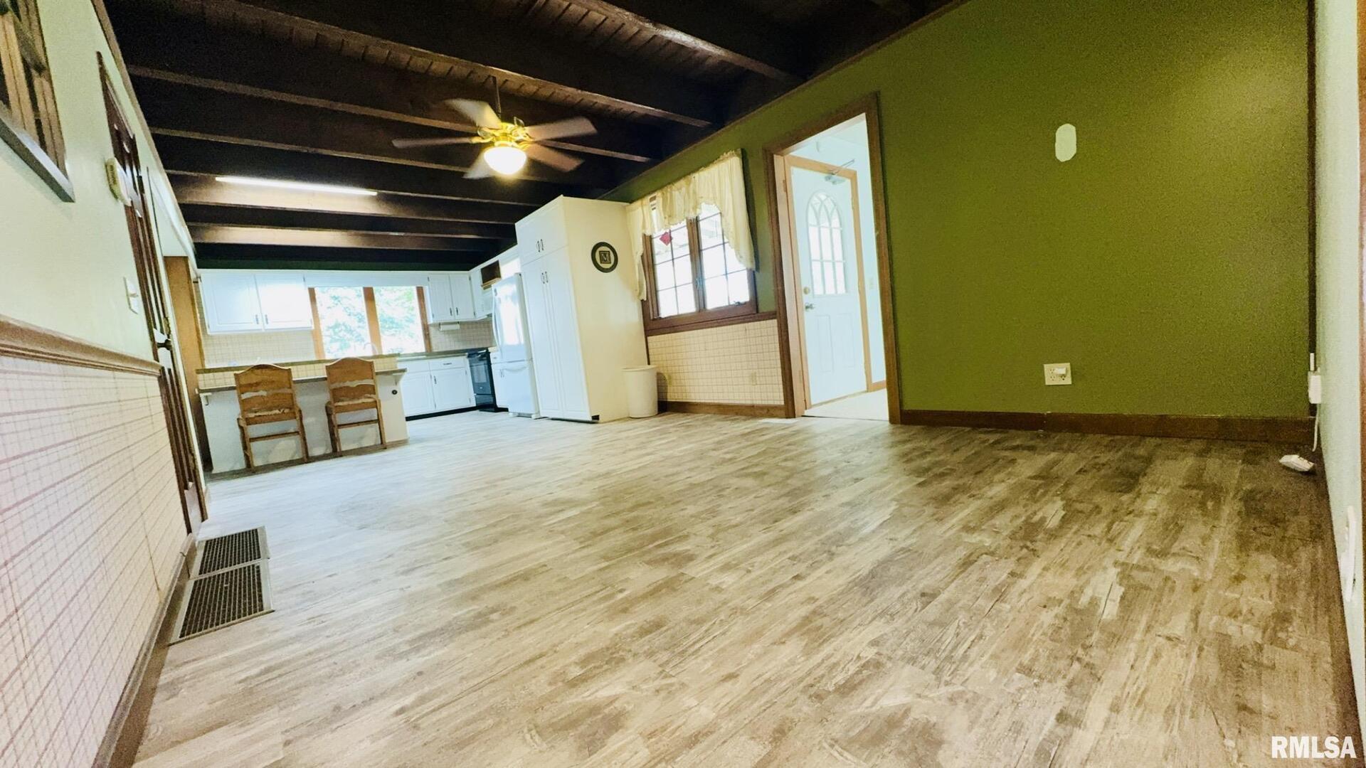 601 1st Street Benton, IL 62812 - Photo 27 of 53 a view of an empty room with wooden floor