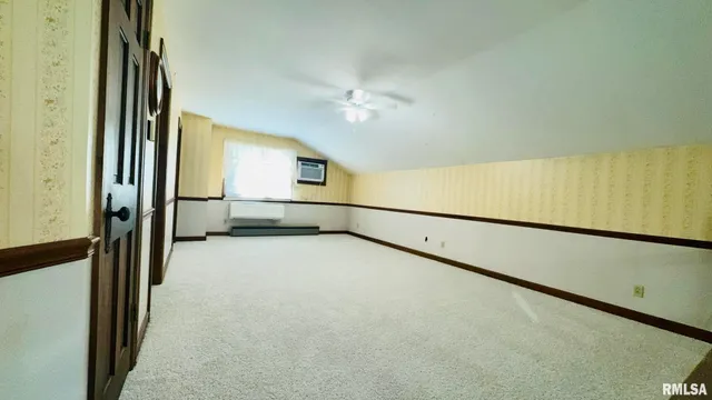 a room with cabinets and window