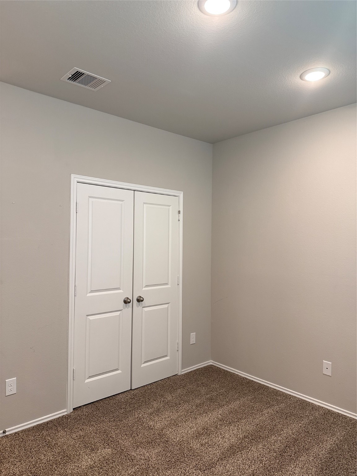 20130 Parkway Lane Montgomery, TX 77356 - Photo 15 of 18 an empty room with white wall and closet