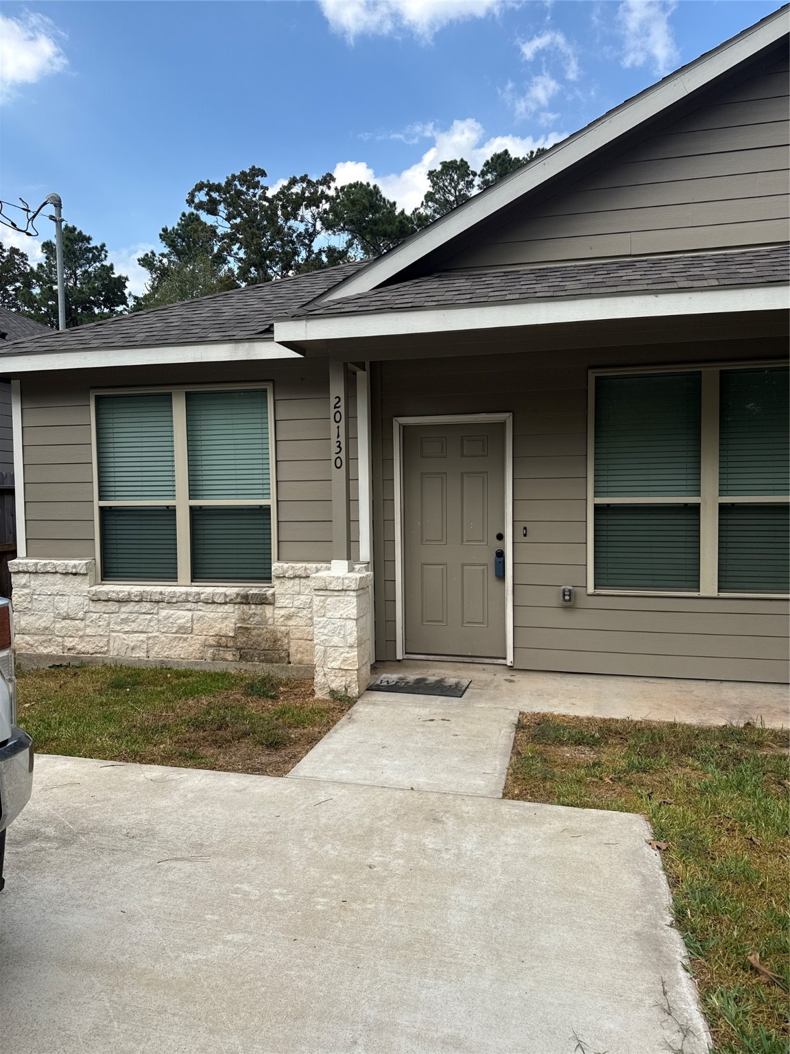 20130 Parkway Lane Montgomery, TX 77356 - Photo 2 of 18 a house with a outdoor space