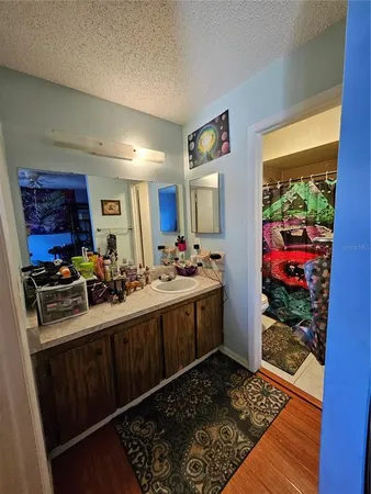 a kitchen with sink refrigerator and stove