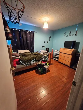 a room with furniture and a flat screen tv