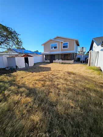 a view of a house with a patio