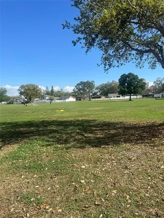 a view of a lake with a big yard
