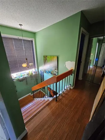 a view of balcony with furniture