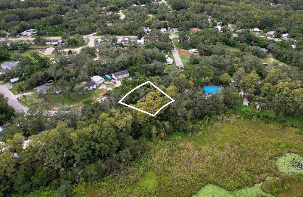 33 Poplar Street New Port Richey, FL 34654 - Photo 3 of 11 an aerial view of a house