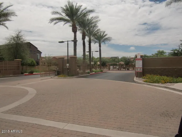 a balcony with palm trees