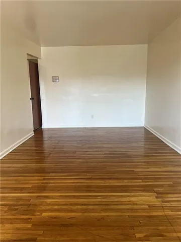 a kitchen with a sink and a stove top oven
