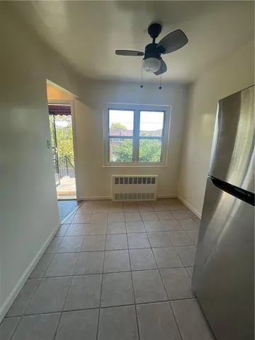 a bathroom with a sink shower and a mirror