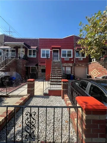 a front view of house with street view