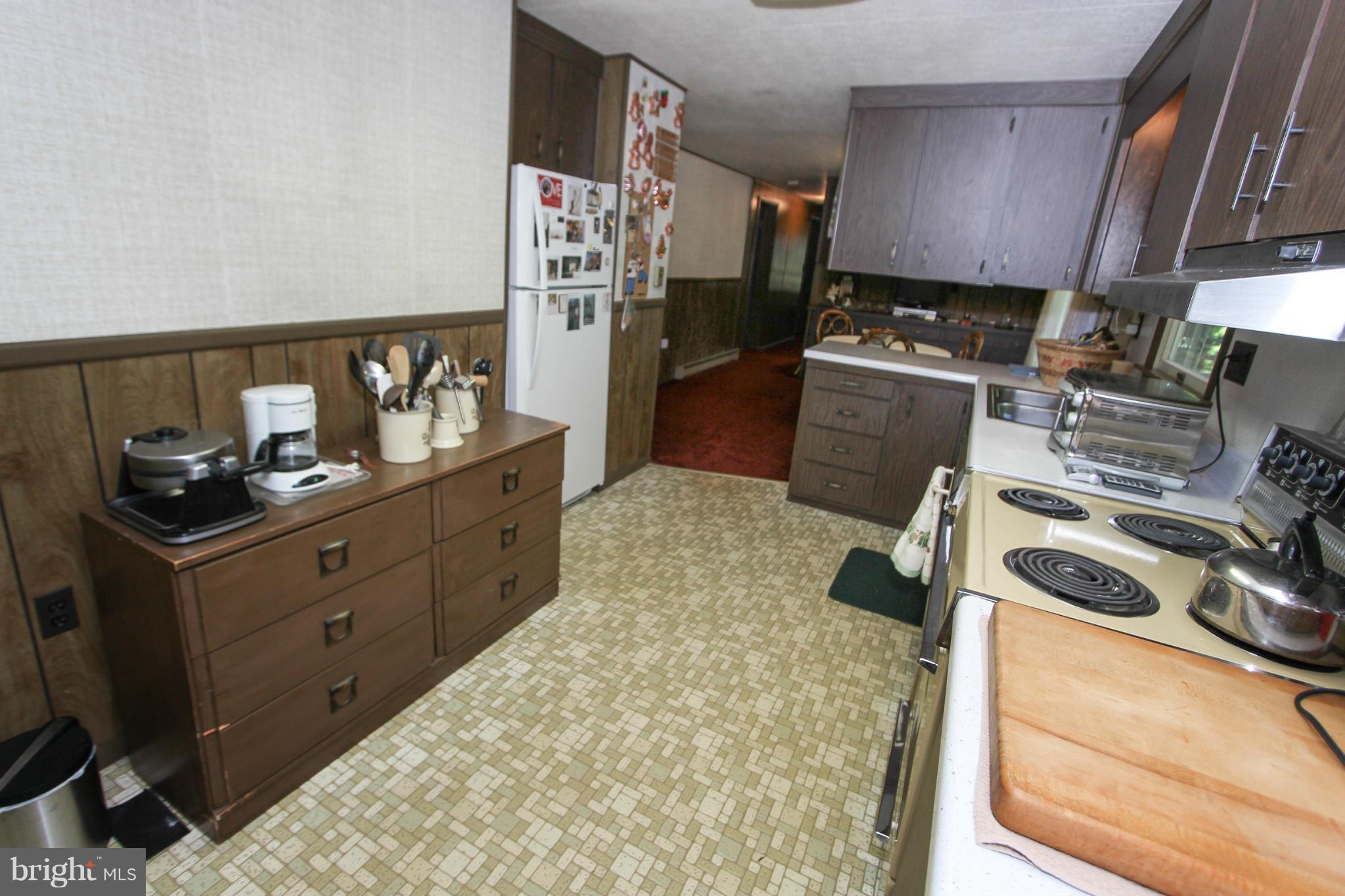 9325 Mountjoy Road Marshall, VA 20115 - Photo 12 of 30 a kitchen with sink a stove and refrigerator