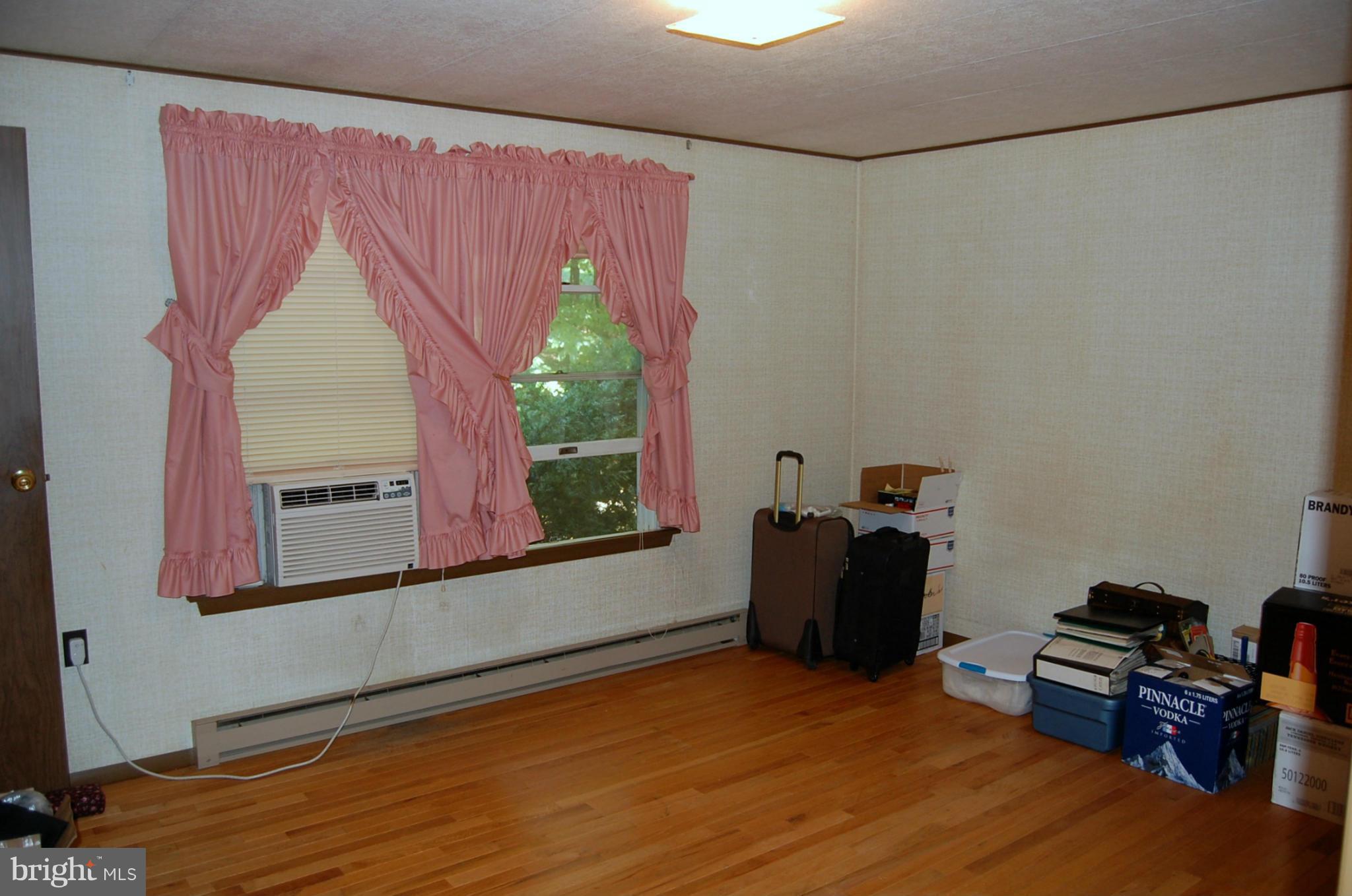 9325 Mountjoy Road Marshall, VA 20115 - Photo 19 of 30 a room with a bed and a window