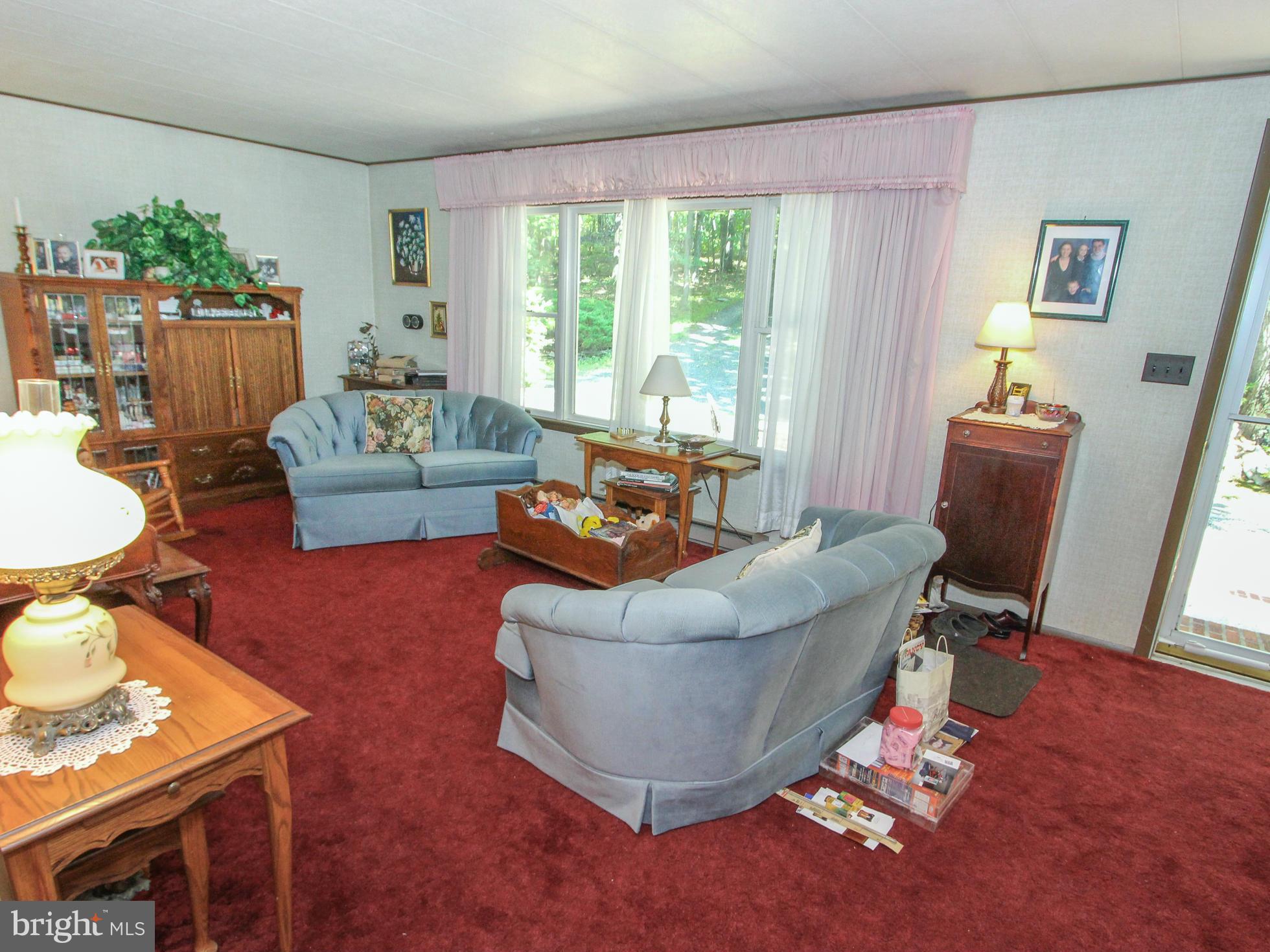 9325 Mountjoy Road Marshall, VA 20115 - Photo 8 of 30 a living room with furniture and a large window
