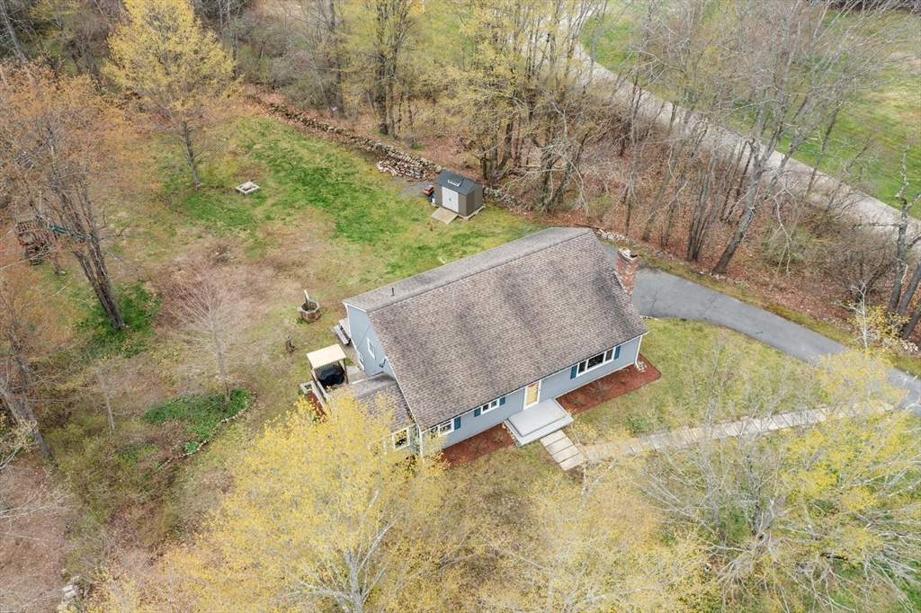 101 Williams Road Ashburnham, MA 01430 - Photo 6 of 42 a aerial view of a yard with large trees