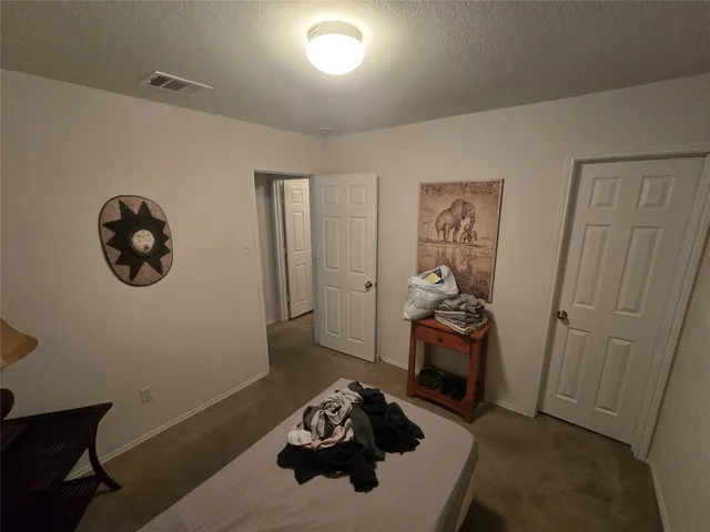 a room with furniture and cabinets