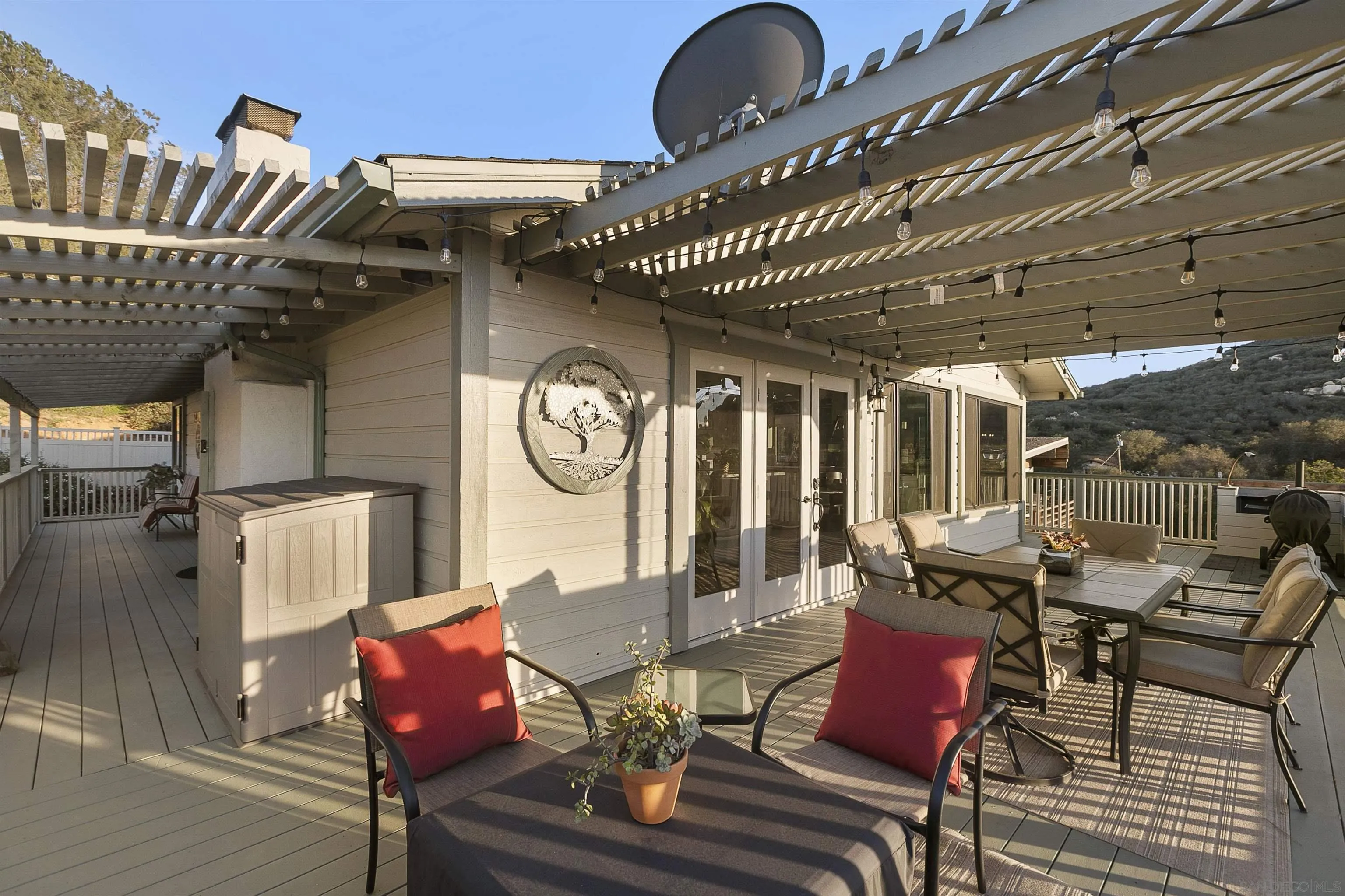 2505 Suncrest Boulevard El Cajon, CA 92021 - Photo 13 of 45 a view of a dining room with furniture window and wooden floor