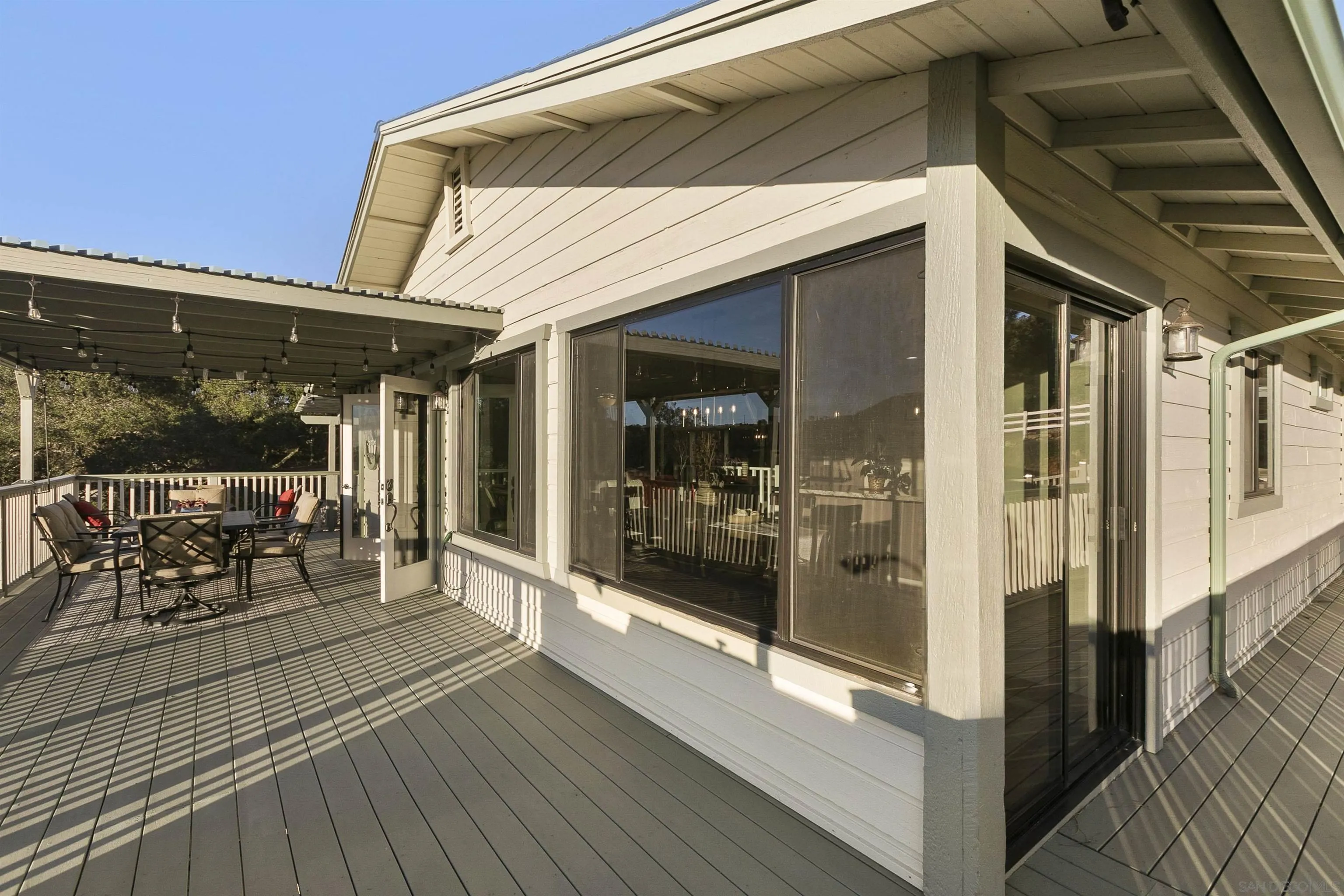 2505 Suncrest Boulevard El Cajon, CA 92021 - Photo 25 of 45 a view of a patio with table and chairs
