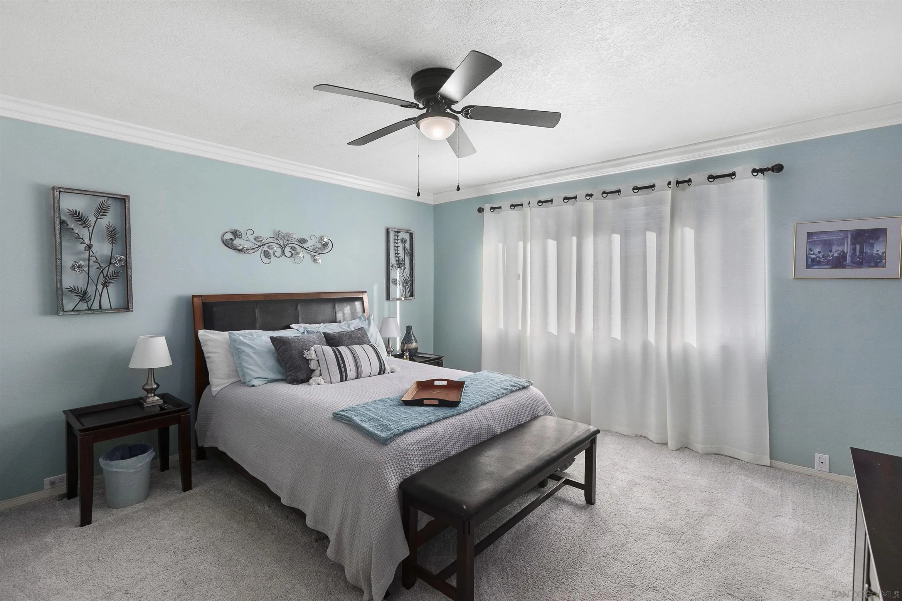 2505 Suncrest Boulevard El Cajon, CA 92021 - Photo 29 of 45 a bedroom with a bed and a chandelier