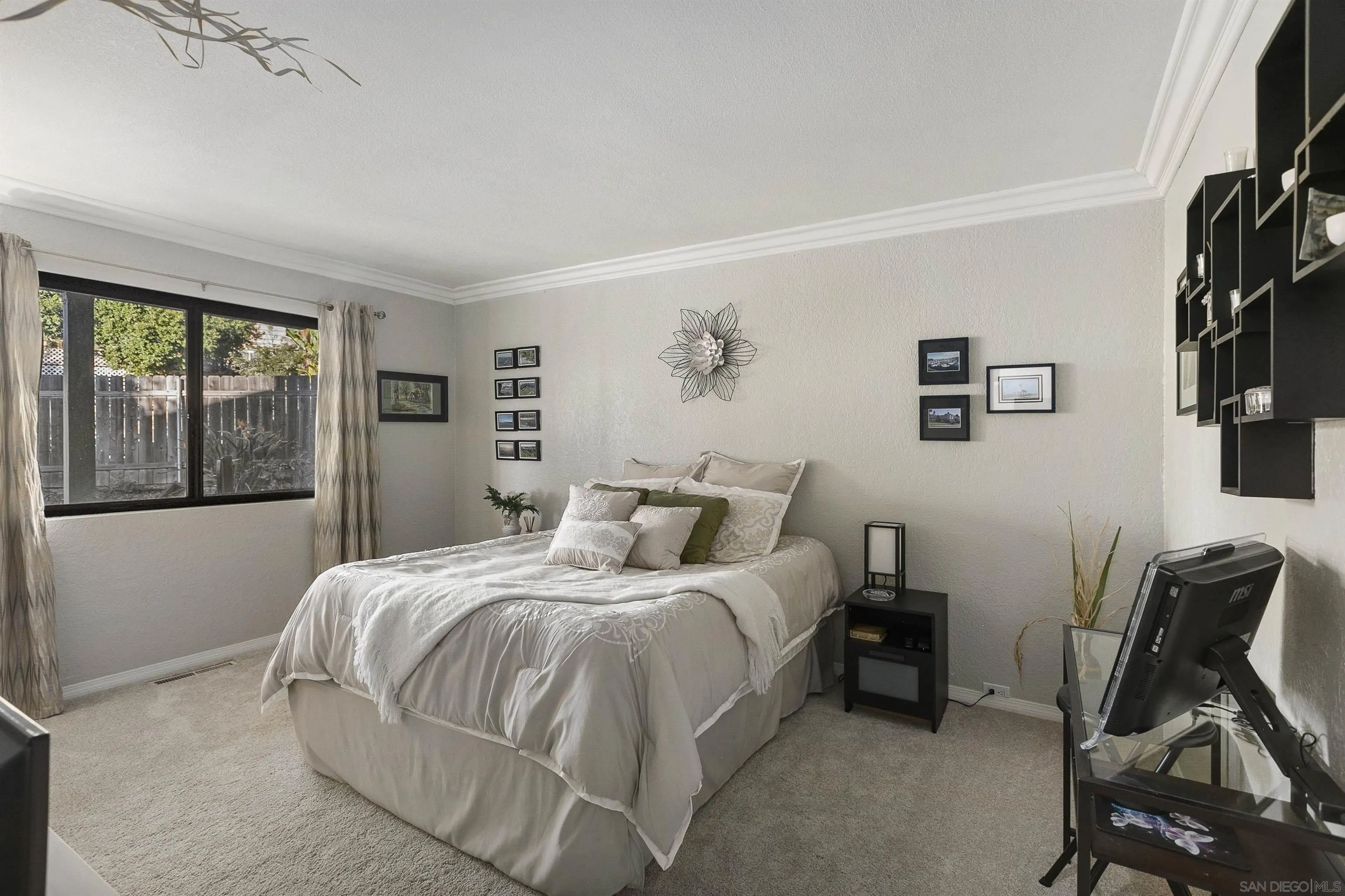 2505 Suncrest Boulevard El Cajon, CA 92021 - Photo 32 of 45 a bedroom with a bed and a chair