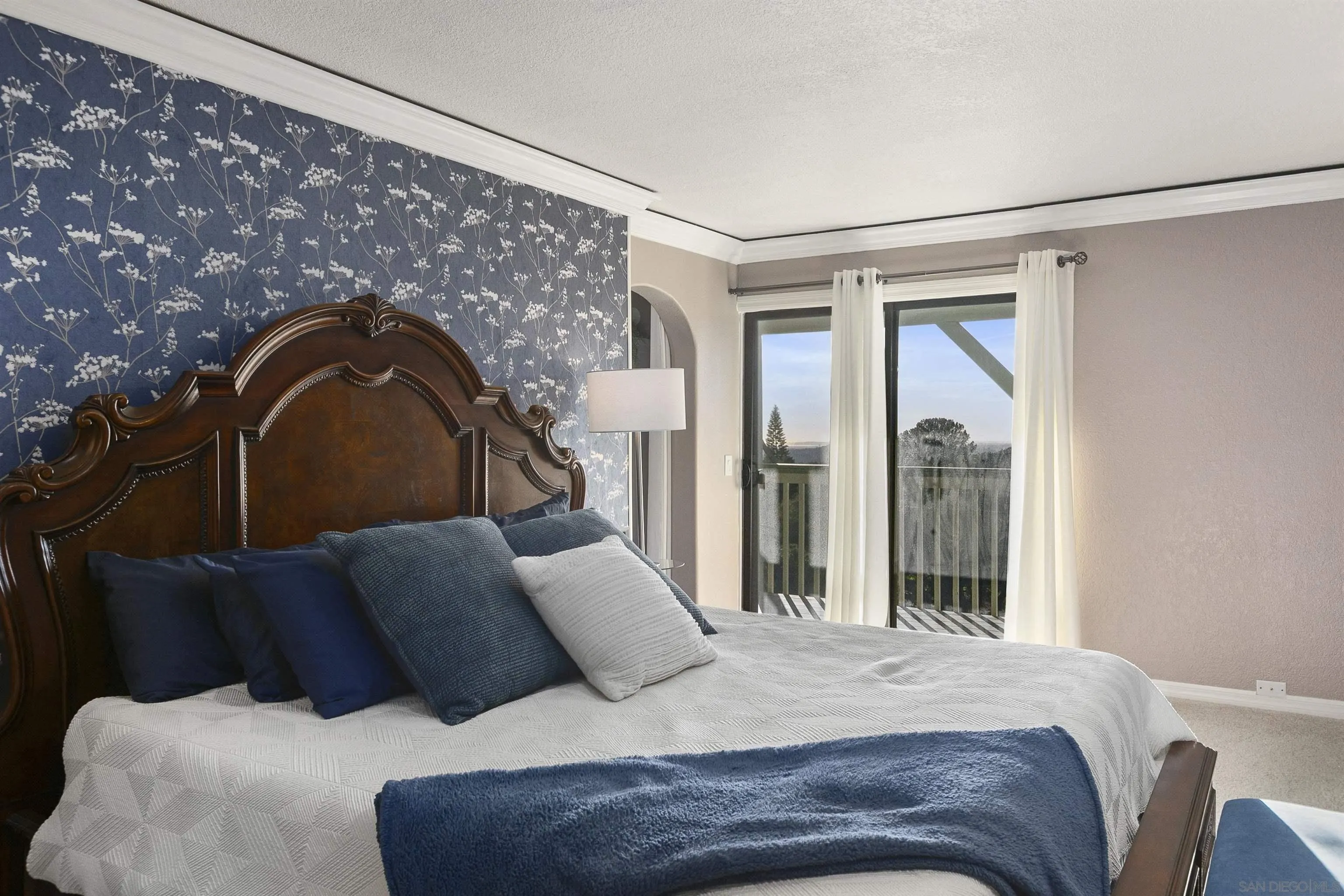 2505 Suncrest Boulevard El Cajon, CA 92021 - Photo 33 of 45 a bedroom with a bed couch and window