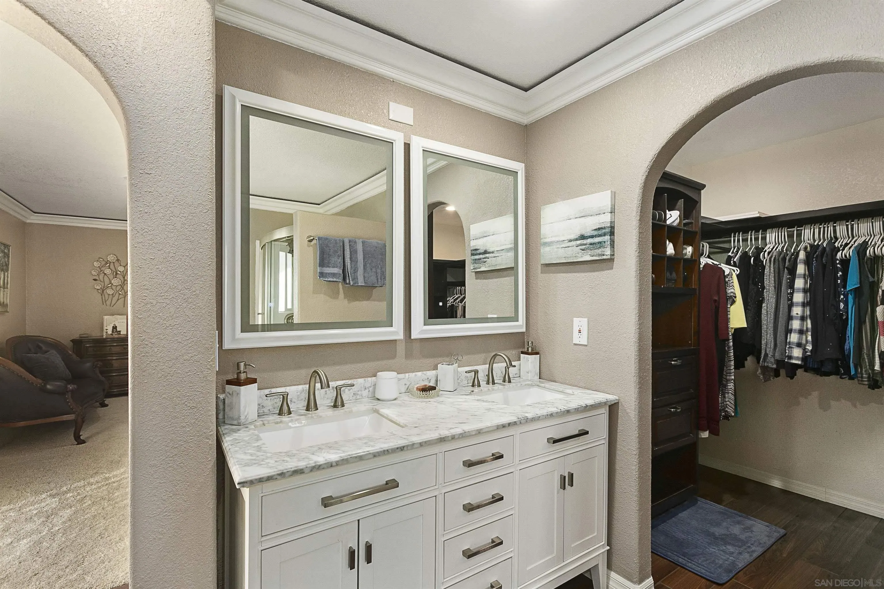 2505 Suncrest Boulevard El Cajon, CA 92021 - Photo 36 of 45 a bathroom with a granite countertop sink a mirror and a