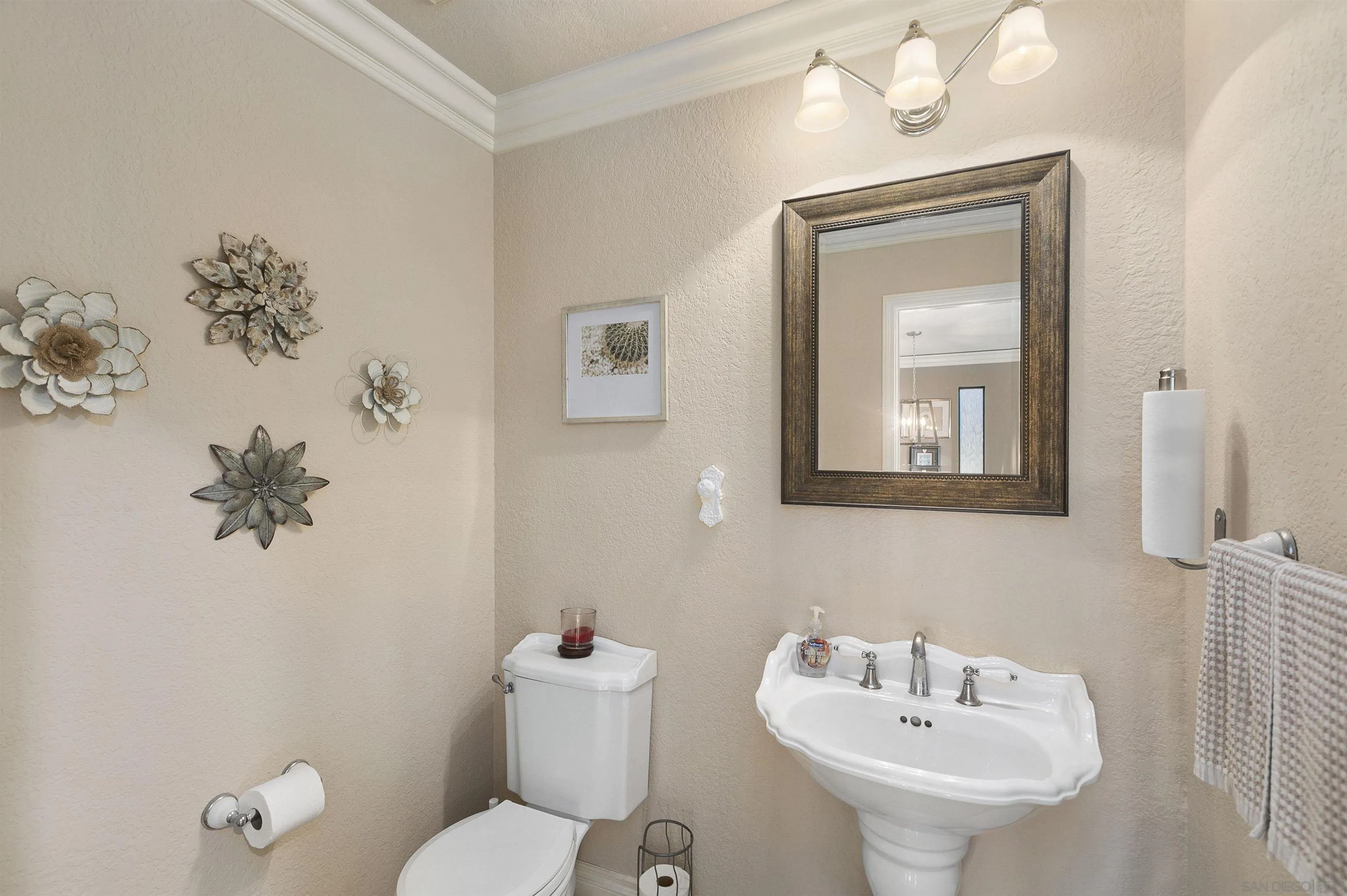 2505 Suncrest Boulevard El Cajon, CA 92021 - Photo 37 of 45 a bathroom with a toilet sink and mirror