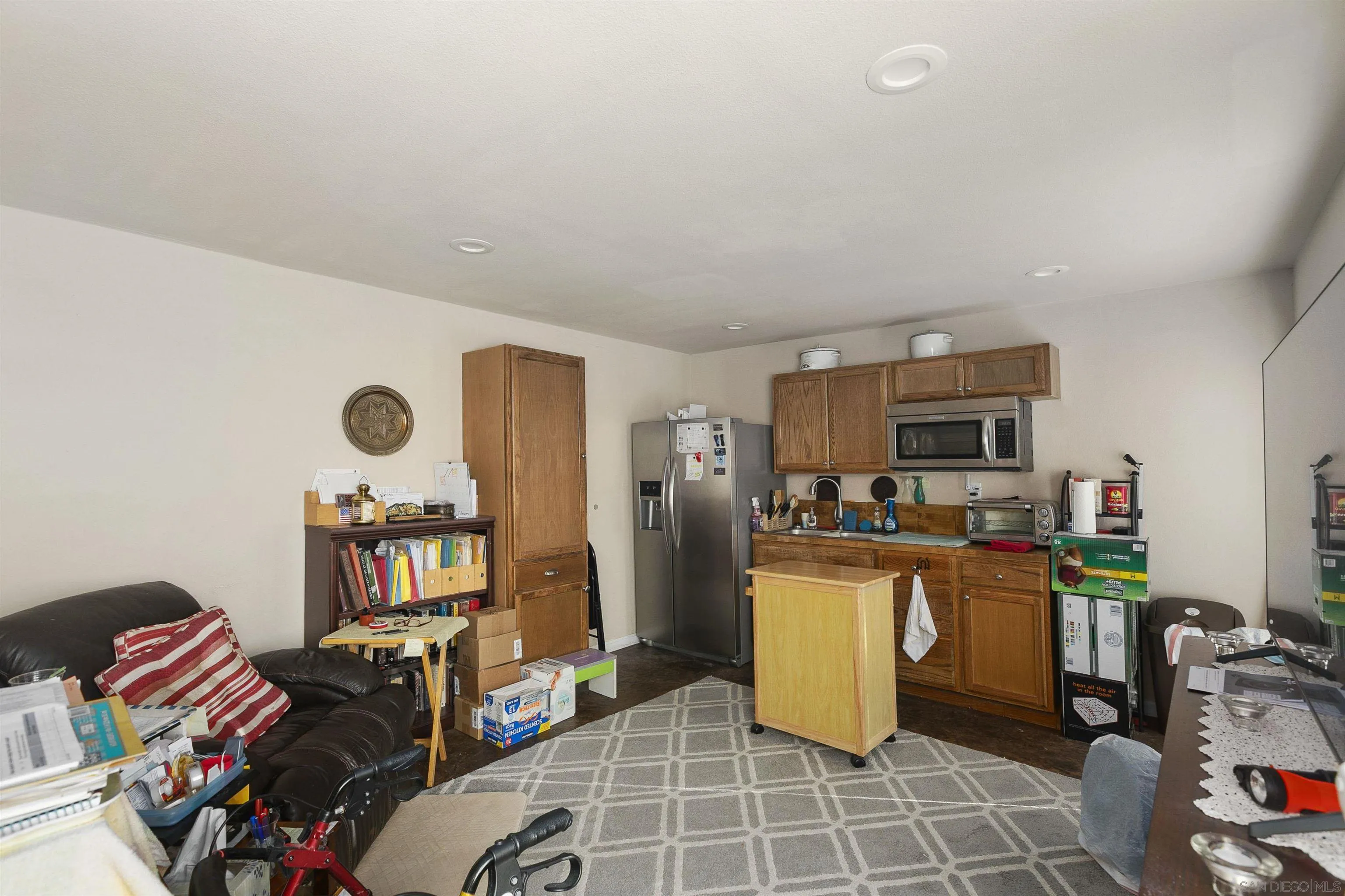 2505 Suncrest Boulevard El Cajon, CA 92021 - Photo 42 of 45 a living room with furniture and a flat screen tv