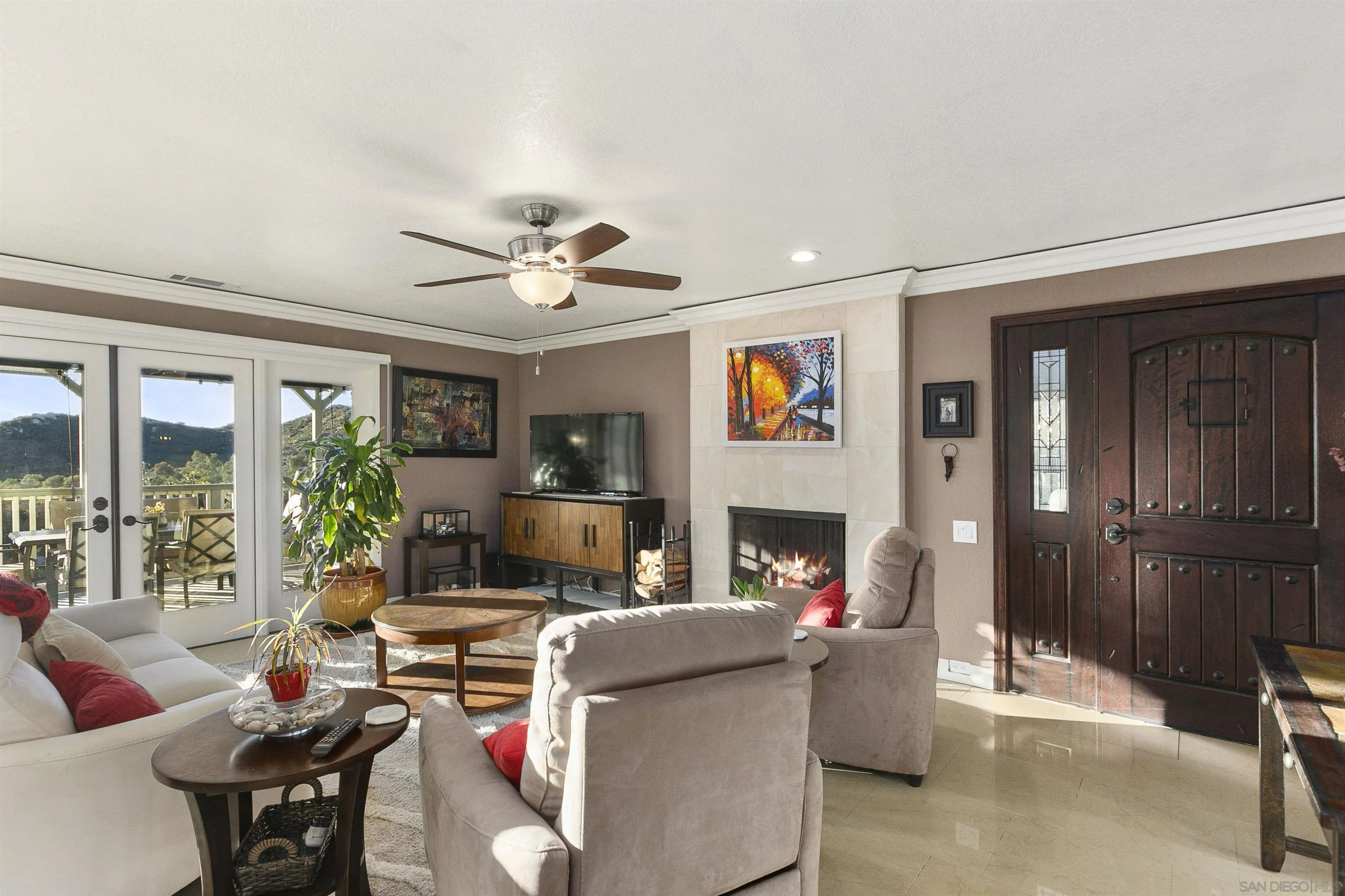 2505 Suncrest Boulevard El Cajon, CA 92021 - Photo 6 of 45 a living room with furniture and a fireplace