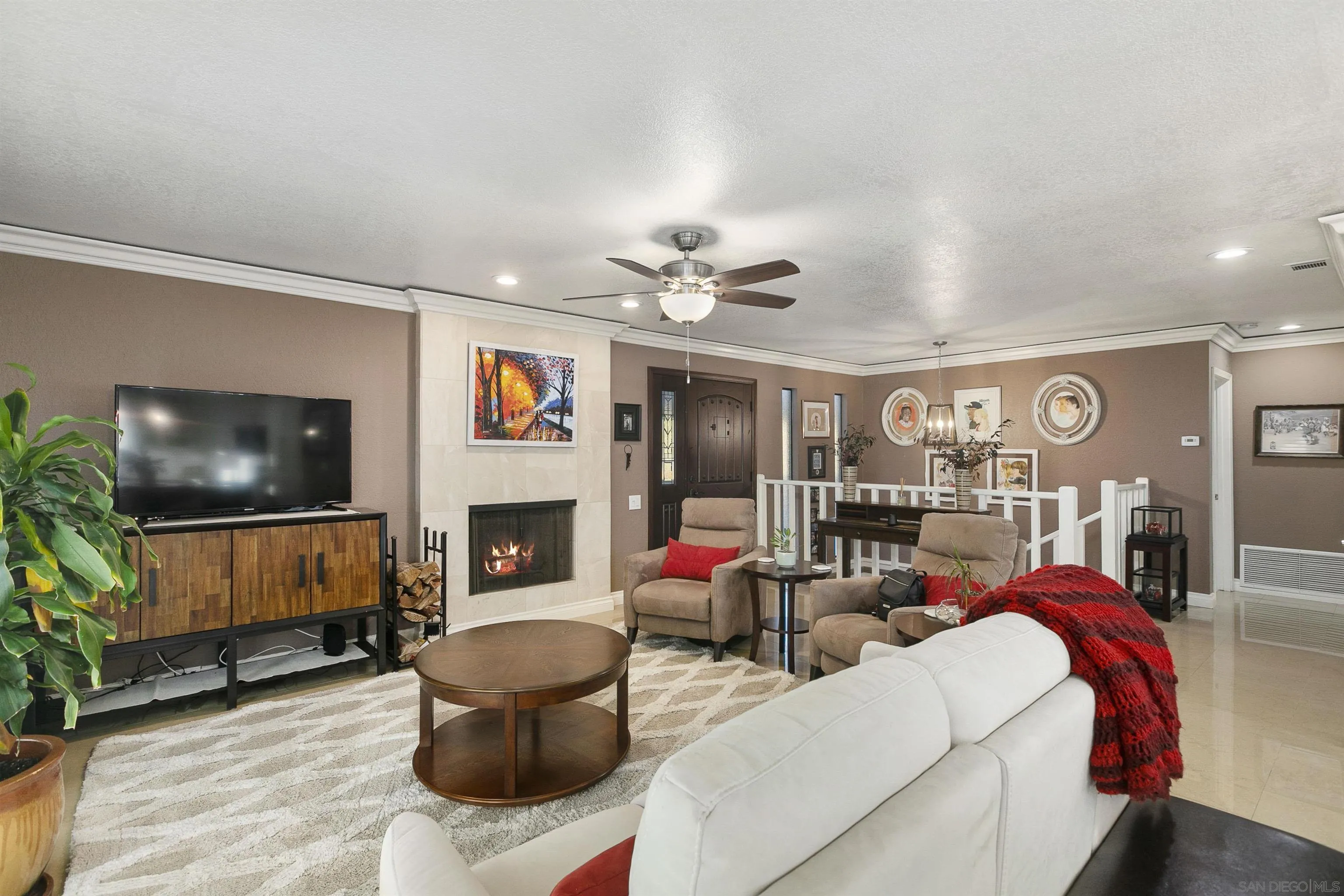 2505 Suncrest Boulevard El Cajon, CA 92021 - Photo 7 of 45 a living room with furniture and a flat screen tv