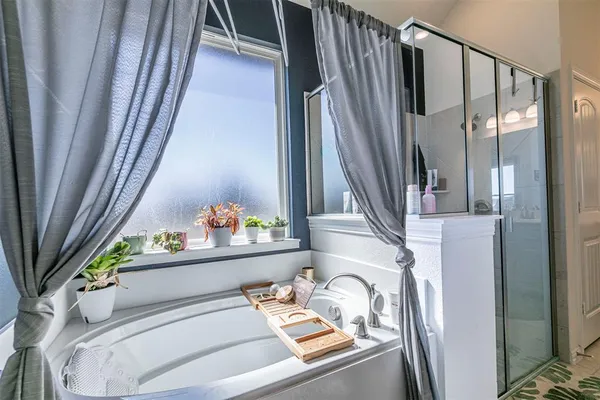 a bathroom with a sink a toilet and a bathtub