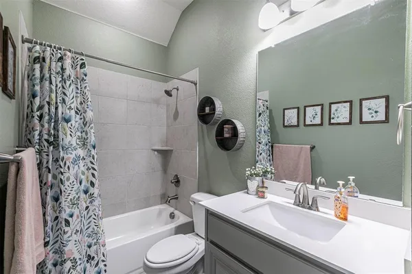 a bedroom with a bed and a closet