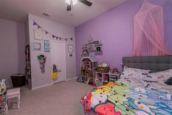 an aerial view of a house with a garden