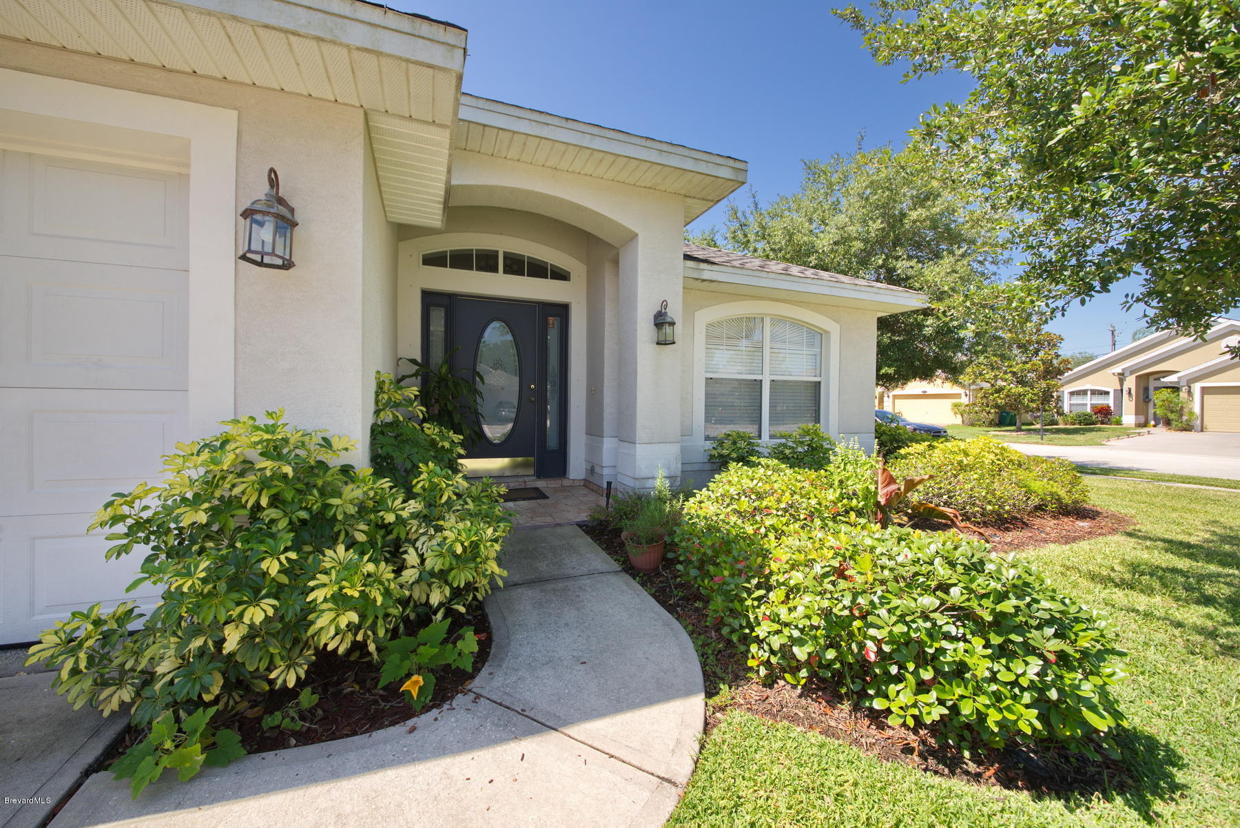 4851 Decatur Circle Melbourne, FL 32934 - Photo 3 of 27 Front Entry Landscaped