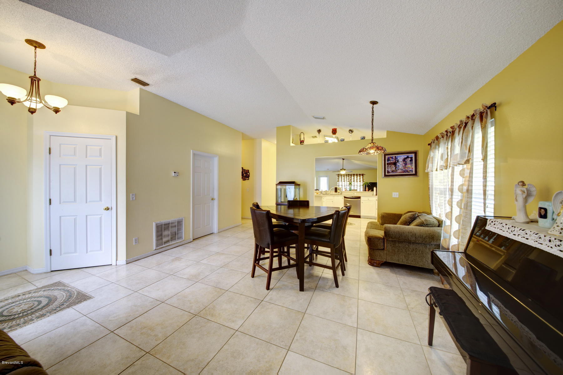 4851 Decatur Circle Melbourne, FL 32934 - Photo 5 of 27 Dining & Living Area
