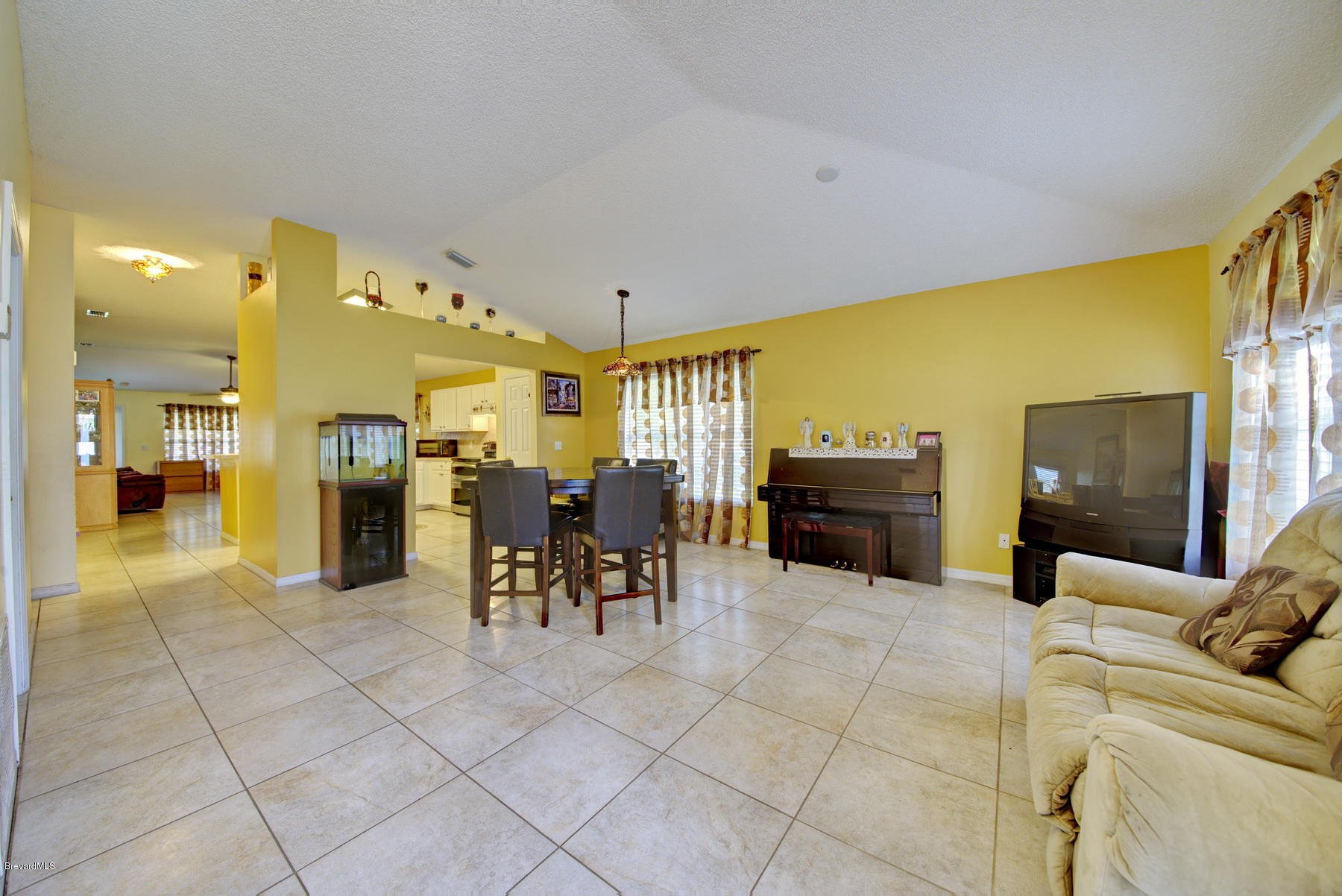 4851 Decatur Circle Melbourne, FL 32934 - Photo 7 of 27 Living & Dining Area