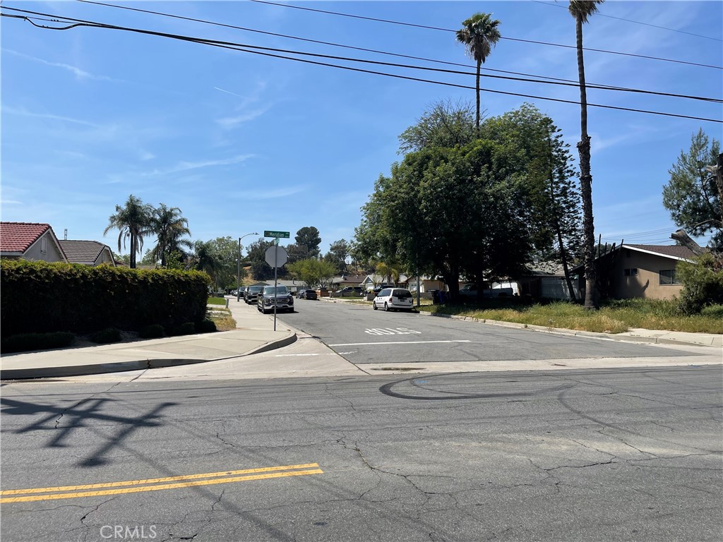 711 Meridian Grand Terrace, CA 92324 - Photo 11 of 15 a view of a road with a building in the background