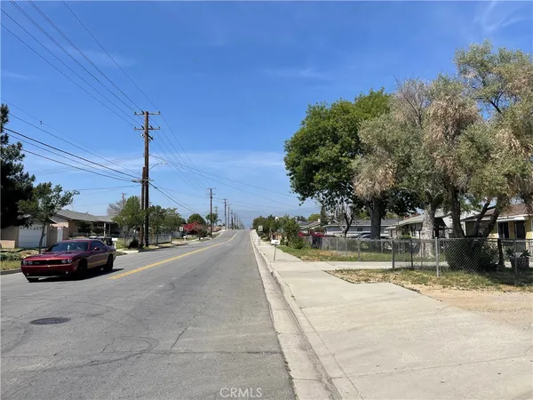 a view of a street with cars