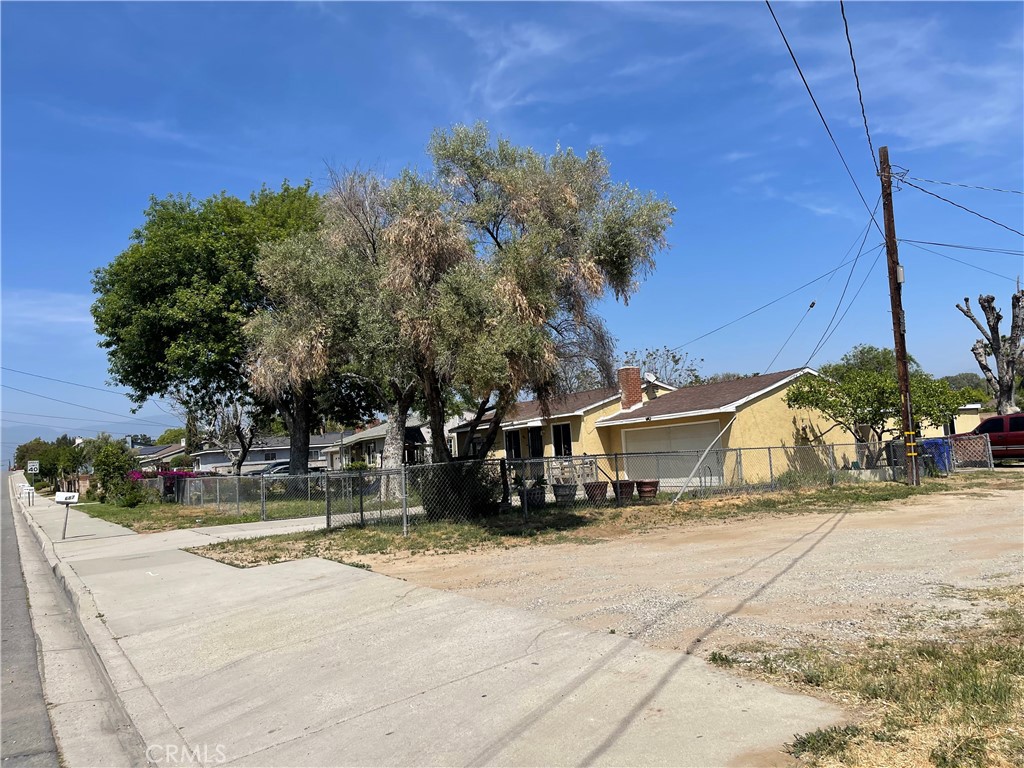 711 Meridian Grand Terrace, CA 92324 - Photo 14 of 15 a view of a house with snow on the road