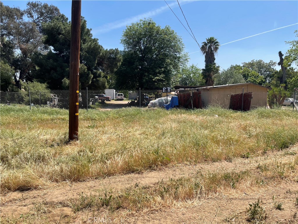 711 Meridian Grand Terrace, CA 92324 - Photo 5 of 15 a swimming pool with wooden fence