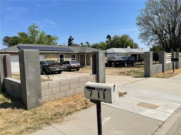 a front view of a house with yard