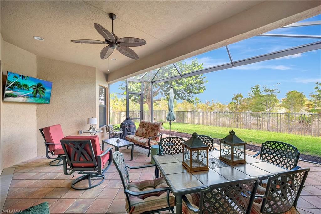 3200 Atlantic Circle Naples, FL 34119 - Photo 34 of 41 a view of a dining room with furniture window and outside view